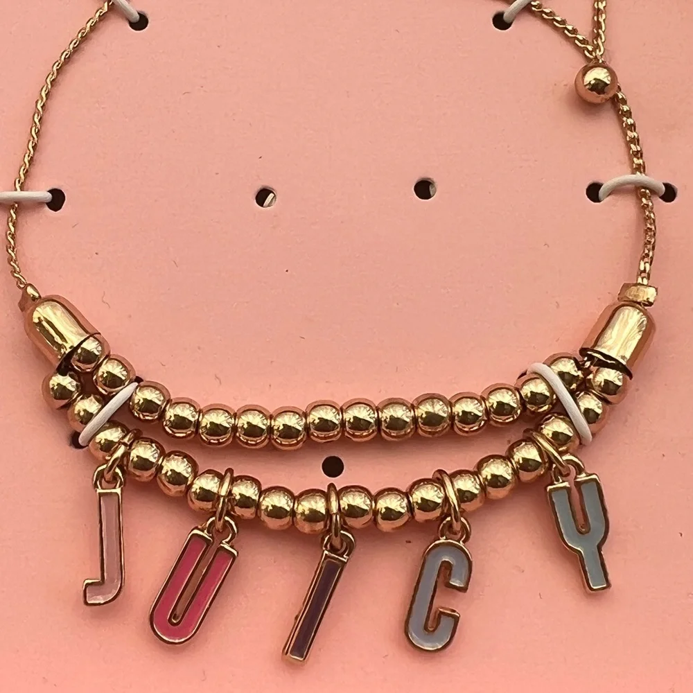 NWT💍Juicy Couture Gold Ton Bead with “Juicy”Enamel Charm Bracelet
